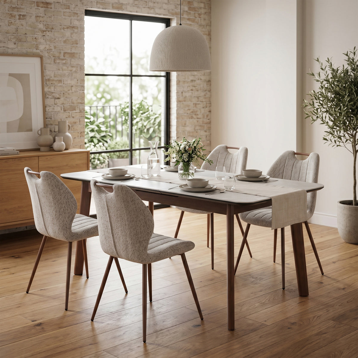 Turin Walnut Latte fabric dining chairs around a dining table