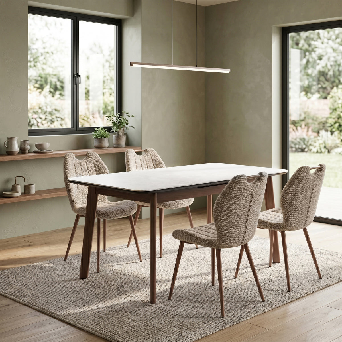Turin Walnut Mocha fabric dining chairs with a dining table viewed from the side